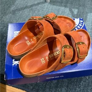 Birkenstock Orange Sandals with Gold Buckles